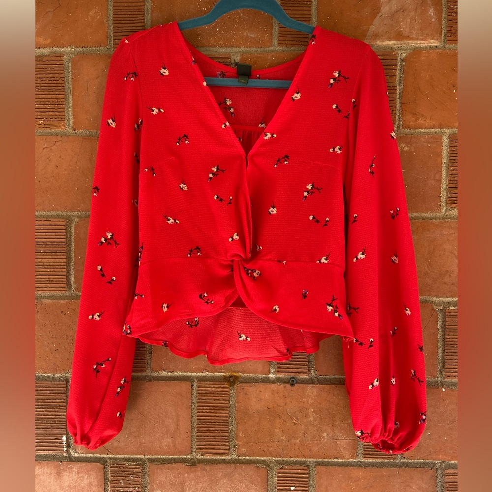Mini peplum/flowy waist blouse